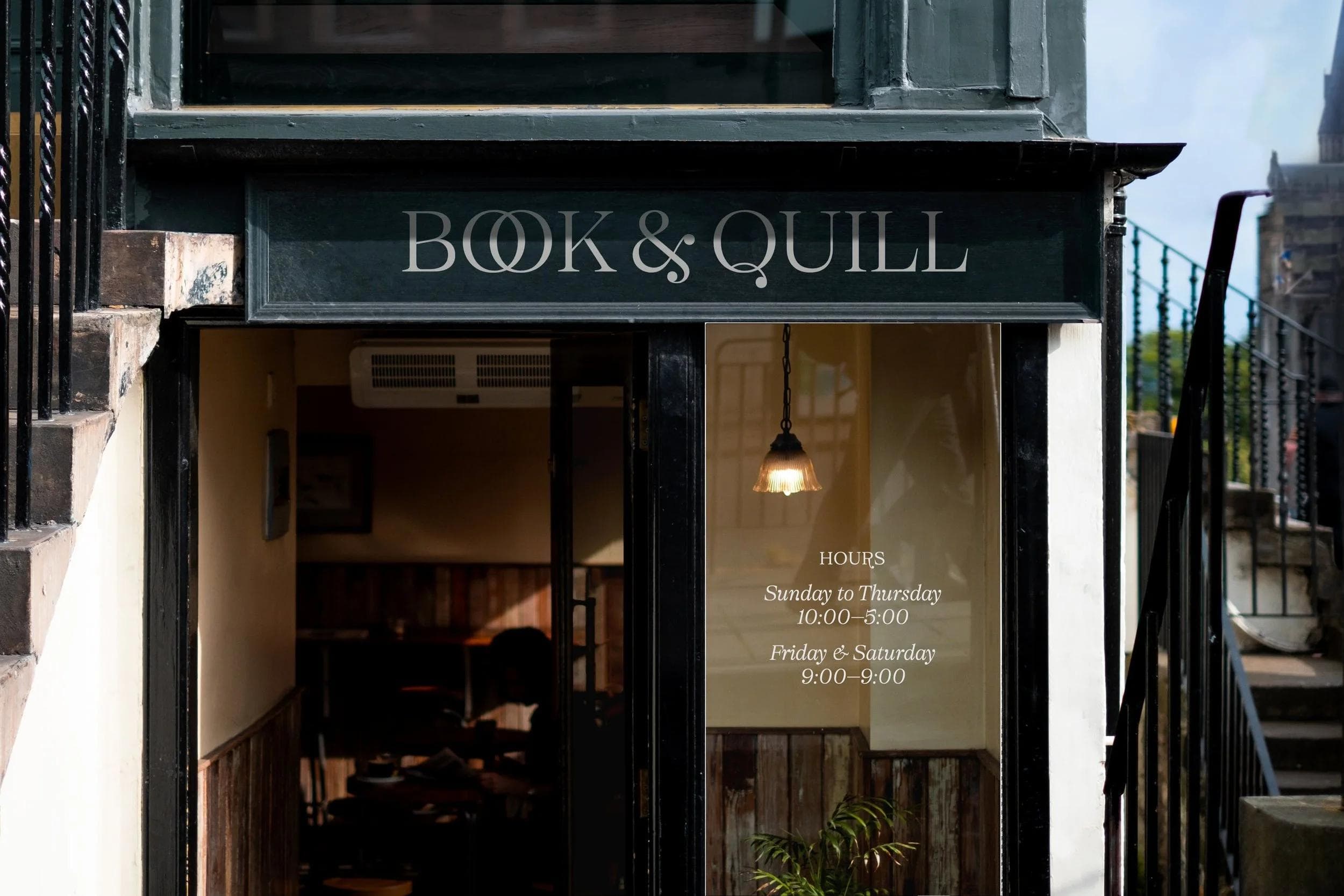 Selestion fictional fonts in use for Book & Quill — a book storefront, hand painted signage typography with ligatures and swash detailing.